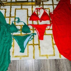 two sets of three piece bikini. One red one green